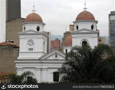 White church with two towers in Medelyn in Colombia