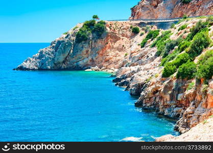 white cliffs stretching into the calm blue sea