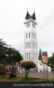 White clock tower in the center of Bukittingi, Indonesia