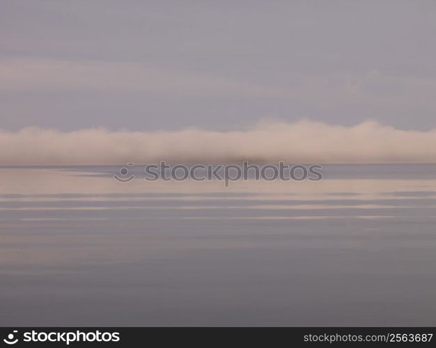 White cloud on the horizon at Sea