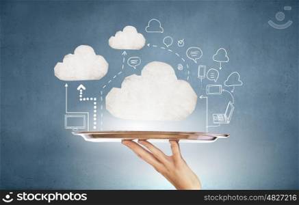 White cloud on tray. Human hand holding metal tray with cloud computing concept