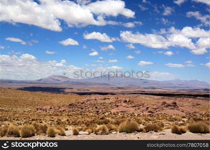 White clouds anmd blue sky in the desert in Bolivia
