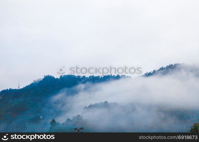 White clouds cover the mountains rocky Global Geopark in Ha Giang, Vietnam