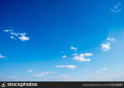 White clouds in blue sky.