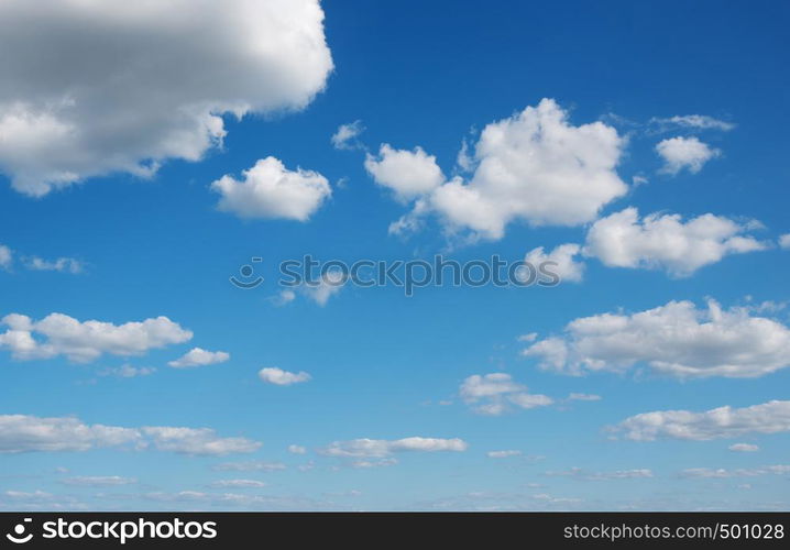 White clouds in blue sky.