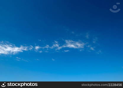 White clouds in clear blue sky