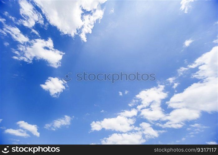 White clouds on the blue summer sky