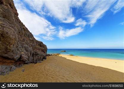white coast lanzarote in spain beach stone water and summer