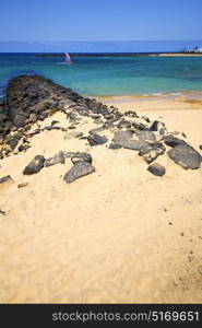 white coast lanzarote in spain beach stone water and summer