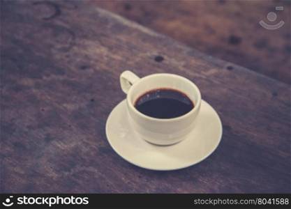 White Coffee Cup on a Wooden Table