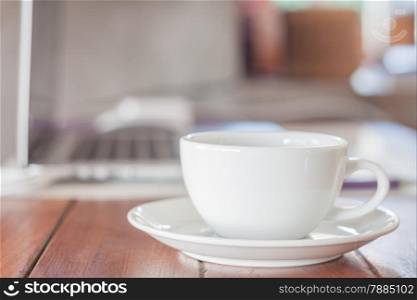 White coffee cup on work station, stock photo