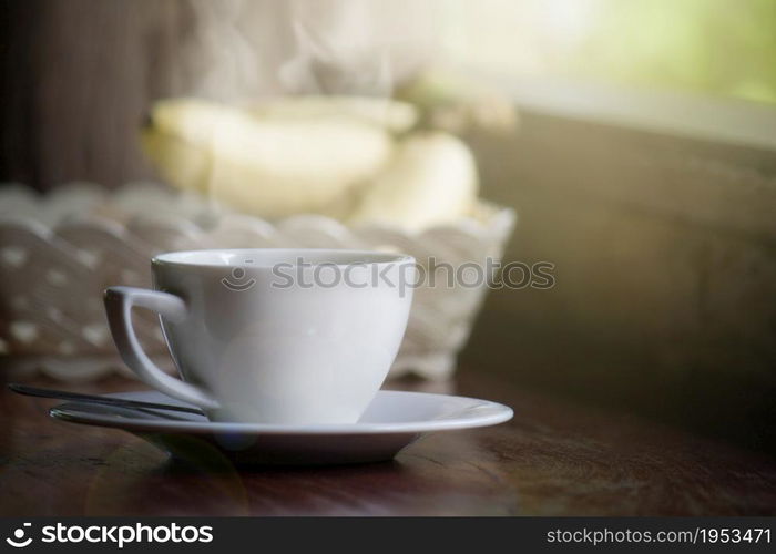 White Coffee Cup With Smoke On Soft Light In Morning For Background