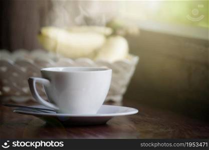 White Coffee Cup With Smoke On Soft Light In Morning For Background