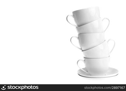 white coffee cups with saucers. Isolated