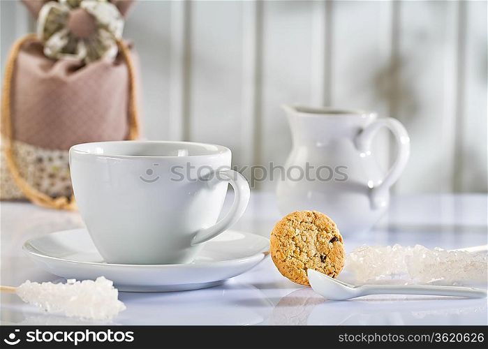 white coffee items on white table