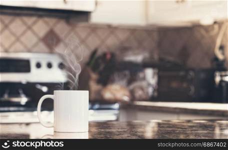 White coffee mug in modern kitchen interior