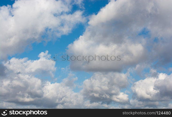 White color clouds found in the  blue sky background