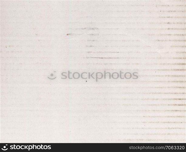 white corrugated cardboard texture useful as a background. white corrugated cardboard texture background