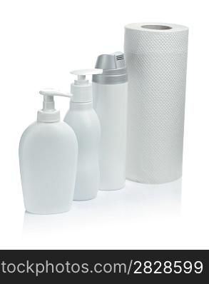 white cosmetical spray and towel