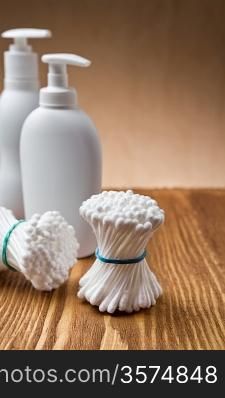 white cotton swabs and bottles