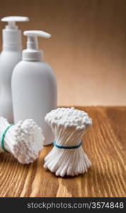white cotton swabs and bottles