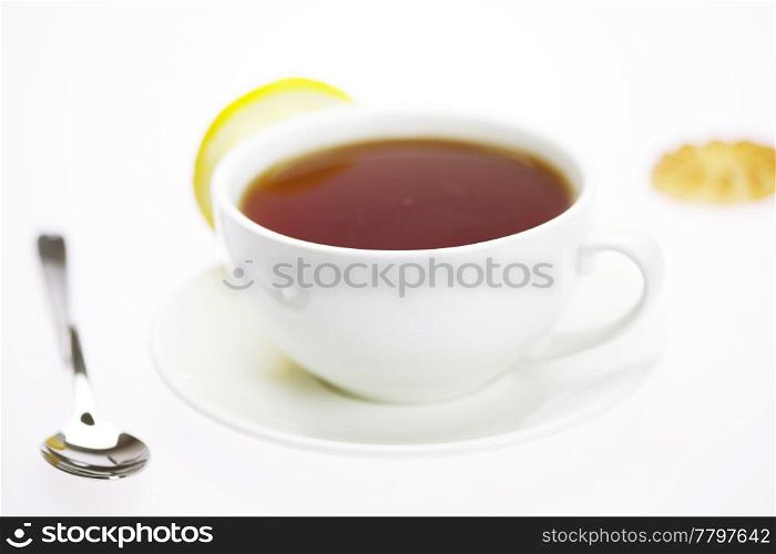 white cup and lemon isolated on white