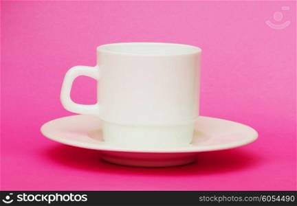 White cup isolated on the colourful background