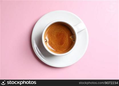 White cup of coffee espresso isolated on pink background