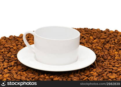 White cup on the background of coffee beans