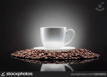 white cup with coffee beans on black