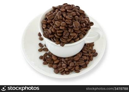 white cup with coffee beans over a white background