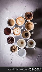 White cups of different stages of preparing cappuccino. Cofee lover concept still life. Coffee is my love