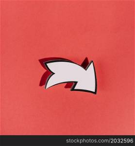 white directional arrow red background
