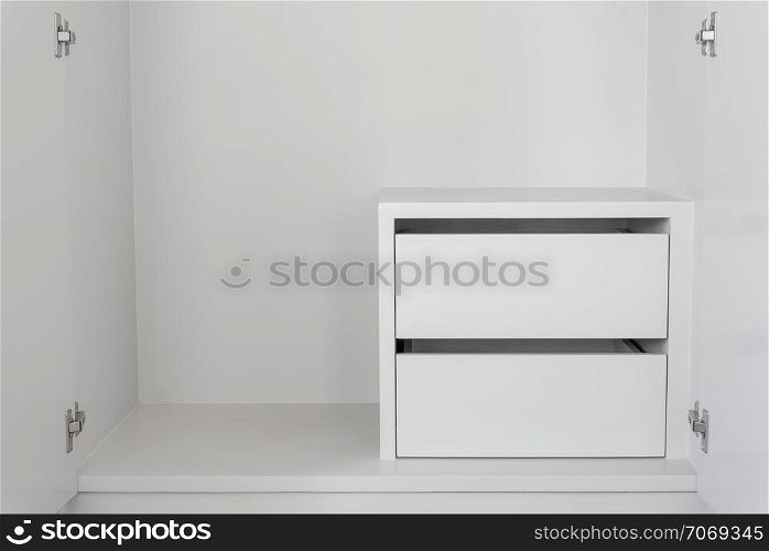 White Drawer in empty cupboard