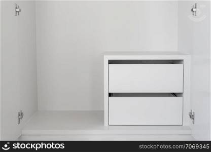 White Drawer in empty cupboard