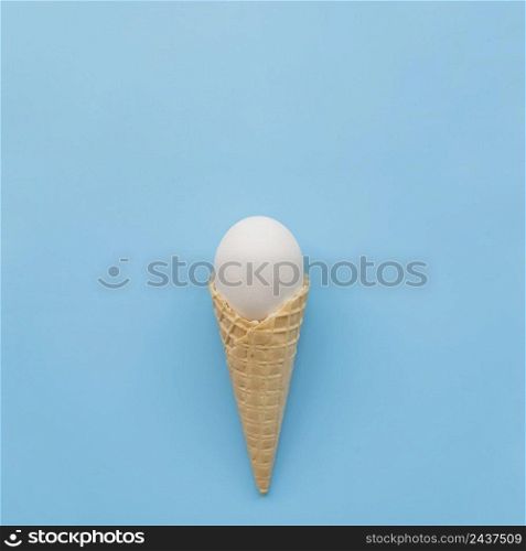 white egg waffle horn blue background