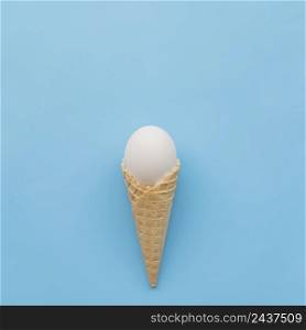 white egg waffle horn blue background