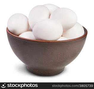 White Eggs Into Ceramic Bowl Isolated On White Background