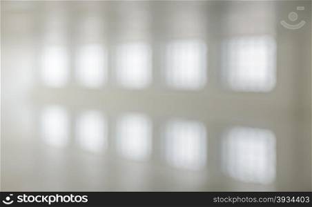 White empty modern office building interior with window shadow. Blur abstract image background