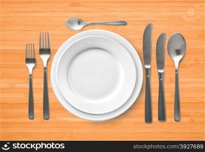 White empty plate with fork and knife isolated on wooden background