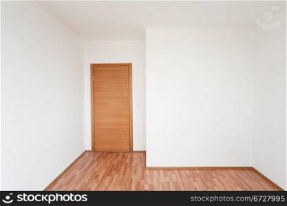 white empty room with door