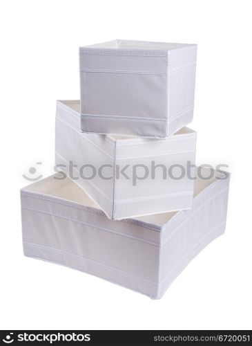white fabric storage boxes isolated on white