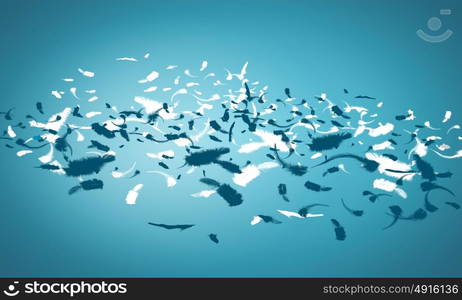 White feathers. Abstract background image of feathers flying in air