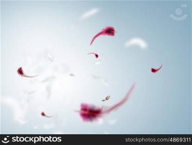 White feathers. Abstract background image of white feathers flying in air