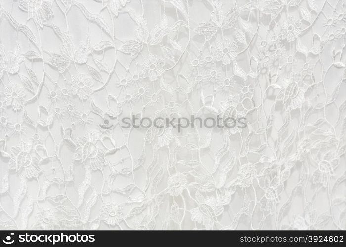 White filet lace, embroidery on cloth for wedding dress, texture
