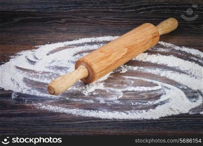 white flour on wooden table
