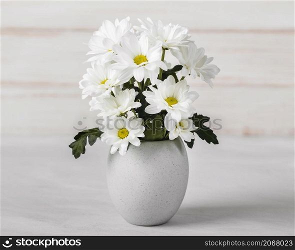 white flowers assortment white vase