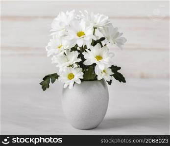 white flowers assortment white vase