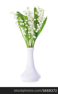 White flowers lilies of the valley in the vase isolated on white background