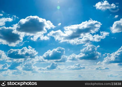 white fluffy clouds in the blue sky